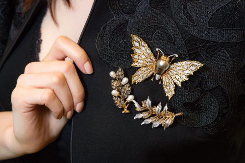 Buccellati brooches with pearls and diamonds in white and yellow gold.