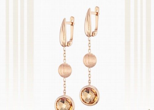 Earrings in red gold with citrine