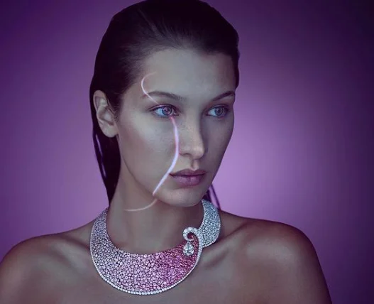 Boghossian set with pink sapphires and diamonds