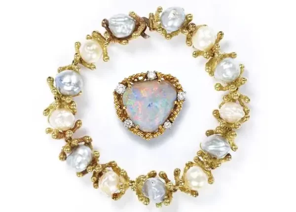 Pearl ring and opal brooch.