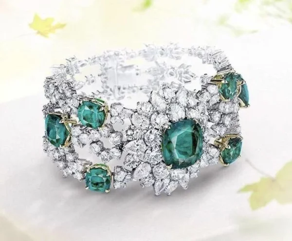 Diamond bracelet with emeralds.
