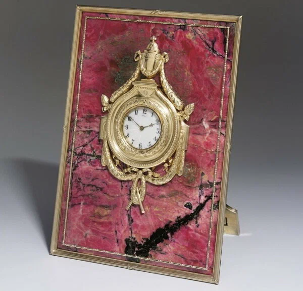 Clock in a frame of rhodonite and gilded silver height 35.5 cm Hjalmar Armfeldt Faberge firm 1908 1917.