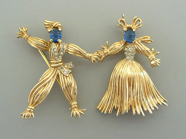 Nenette and Rintintin gilded with blue glass.