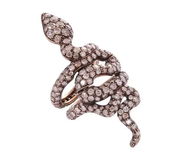 Serpent ring in white gold and cognac colored diamonds. Serpent ring in white gold and cognac colored diamonds.