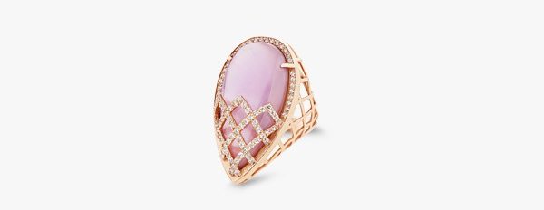 18K gold ring set with zirconium and opaline. 18K gold ring set with zirconium and opaline.