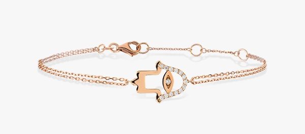 Delicate curb chain in 18K rose gold with a central piece in the shape of a Khmissa set with diamonds. Delicate curb chain in 18K rose gold with a central piece in the shape of a Khmissa set with diamonds.