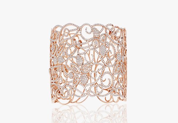 Rose gold cuff set with diamonds. Rose gold cuff set with diamonds.