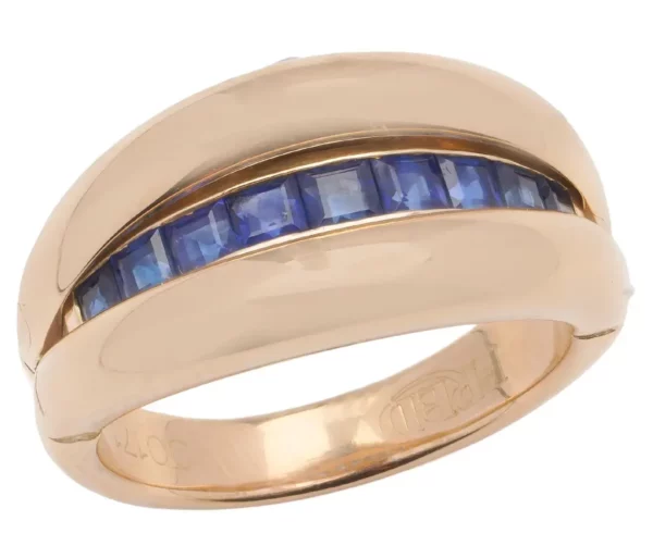 Fred Paris ladies 18kt. yellow gold and sapphire ring.
