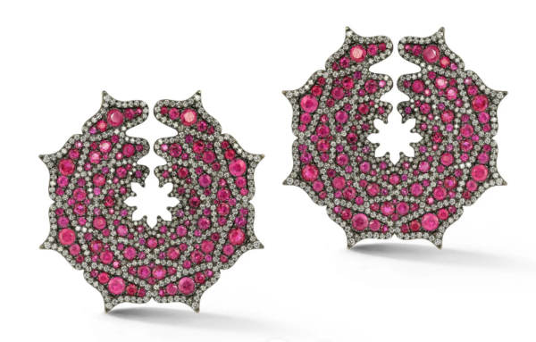 Round cut rubies diamonds in a spider web motif