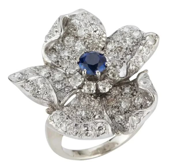 Sapphire Pave Diamond Flower Cocktail Ring 1 round cut sapphire surrounded by pave diamonds