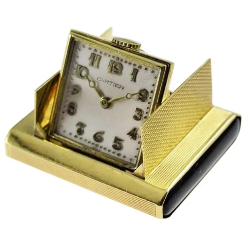 Настольные дорожные часы Cartier из цельного золота 18 карат с кнопками из оникса 1930 е годы