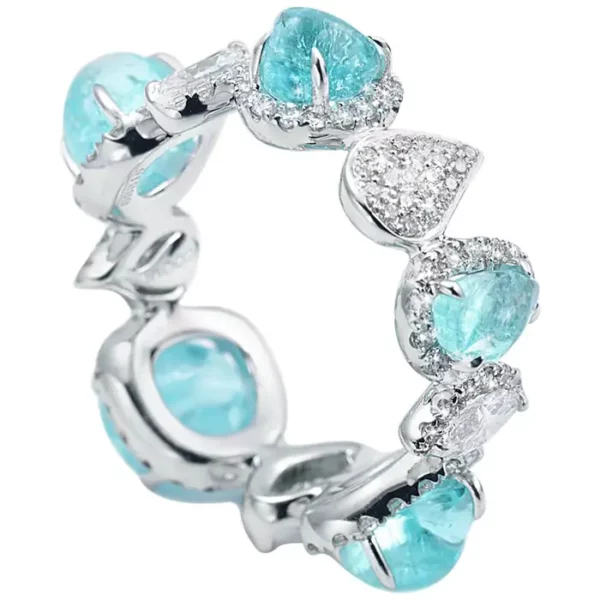 18 Karat White Gold Paraiba and Diamond Band Ring.