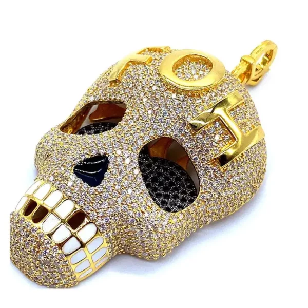 Uncensored Coomi Skull Pendant Set in 20 Karat Gold.