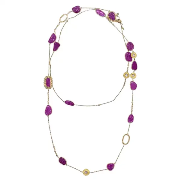 Vintage 34.30 Carat Carved Ruby and Diamond Necklace.