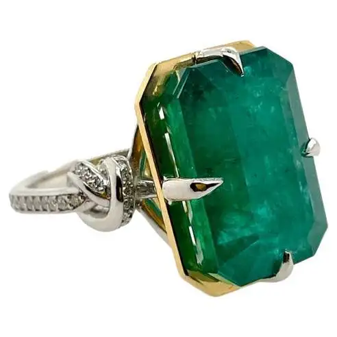 11ct Zambian emerald ring with diamonds 22k yellow gold and platinum.