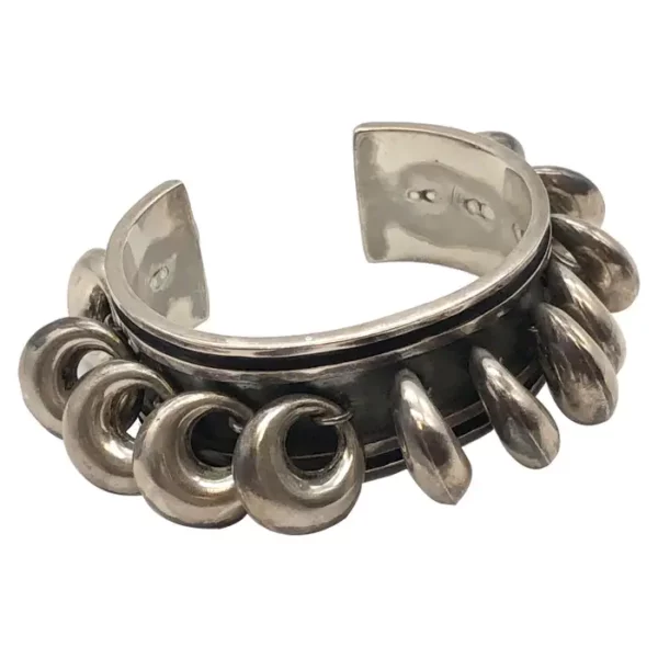 Los Castillo Vintage Modernist Sterling Cuff Bracelet with Dangling Doughnuts.
