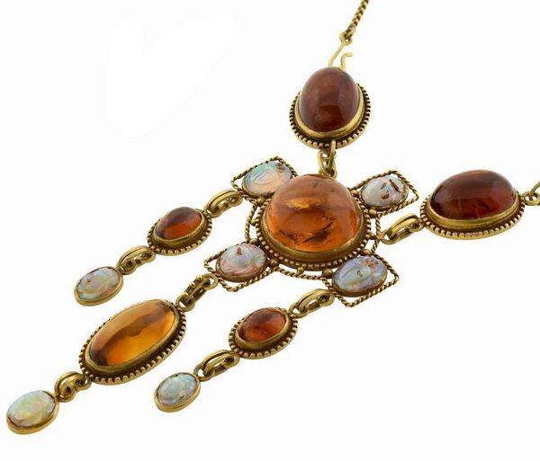 Scarab opals have an incredible palette of iridescent colors in shades of yellow, green, blue, purple and pink, perfectly complementing the rich color of amber.