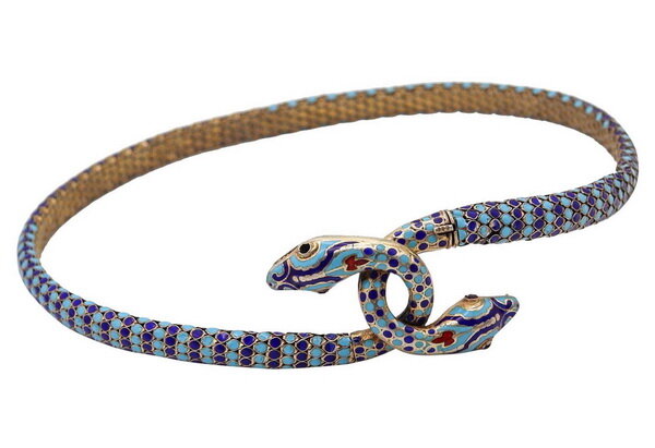 Silver gilt necklace of intertwined snakes, decorated with enamel and garnets, France, circa 1880.