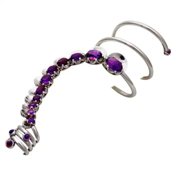 Bracelet and ring in one piece with silver crimped amastistas Guerrero state, chiseling technique and openwork.