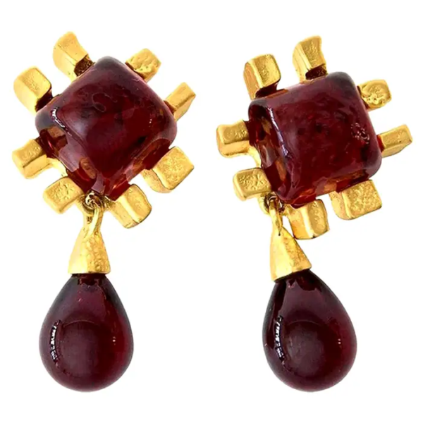 Vintage clips from jewelry artist Andrew Springarn. Made in the style of the Gripoix house from cast red glass