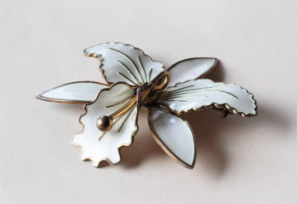 Aksel Holmsen Silver brooch with gold plated Orchid.