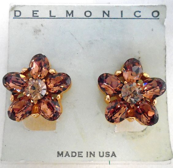Earrings in the form of flowers with chocolate crystals.