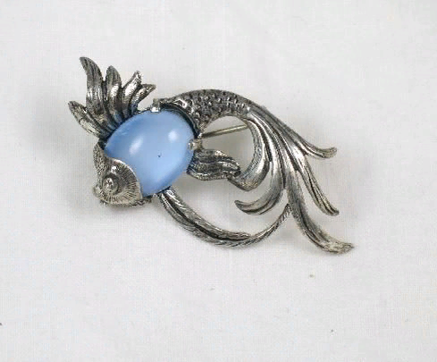 Fish brooch with moonstone..