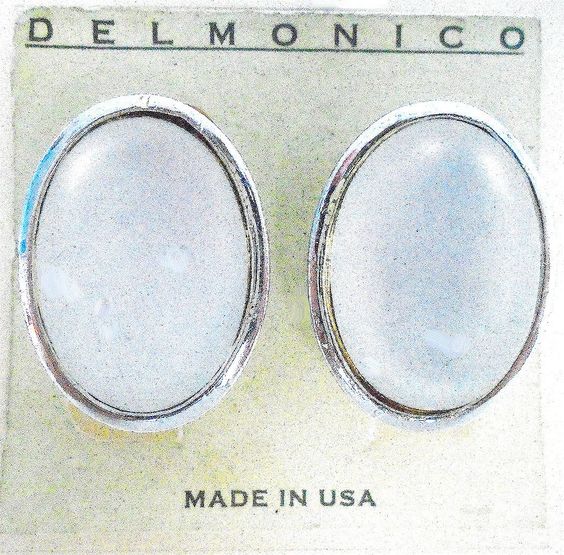 Oval clips with white cabochons.