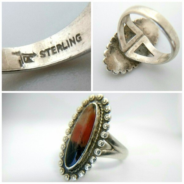 Silver ring with a tiger's eye.