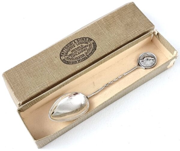 Silver teaspoon.