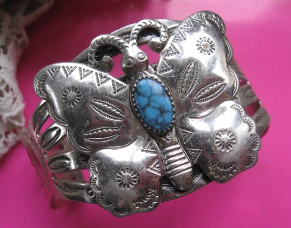 Solid silver plated bracelet with turquoise.