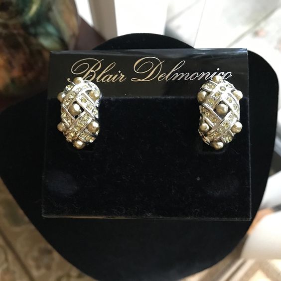Vintage clips with white rhinestones.