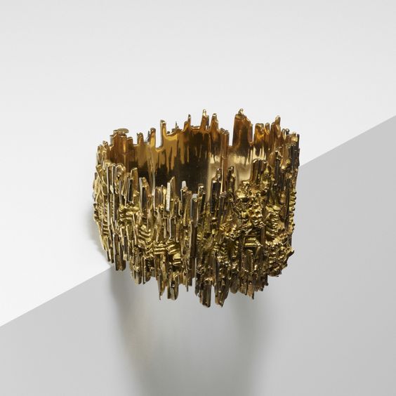 Sculptural gold bracelet.