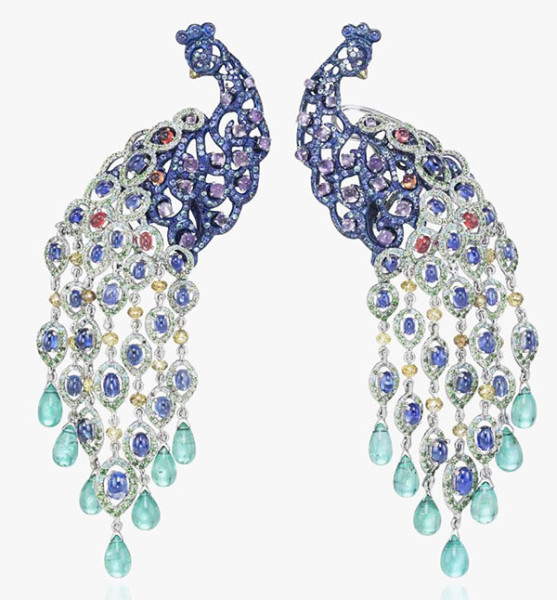 Chopard earrings in the form of two peacocks are decorated with sapphires