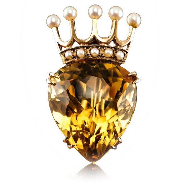 Citrine pendant brooch set in gold with pearls, circa 1950. Citrine pendant brooch set in gold with pearls, circa 1950.