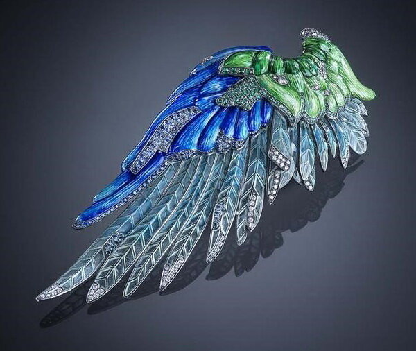 One of a kind “Wing” brooch in silver and gold with sapphires, emeralds, diamonds, enamel and aquamarine, Luz Camino.