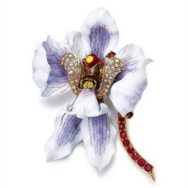 Orchid brooch of the Indian variety Phalaenopsis schillerianum design by Paulding Farnham gold enamel diamonds rubies Tiffany Co circa 1889.