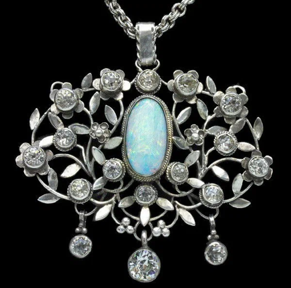 Silver pendant set with crystal and opal Arthur and Georgie Gaskin circa 1907.