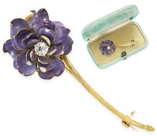 The brooch presented at the 1889 Worlds Fair in Paris along with Paulding Farnhams orchids is adorned with a single diamond dewdrop 5.2 cm high gold enamel diamond Tiffany Co circa 1900.