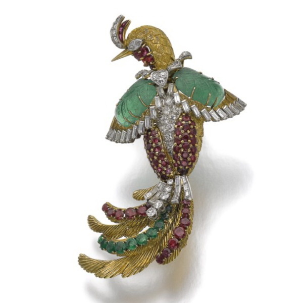 Brooch in gold with emeralds, rubies and diamonds, Mauboussin, circa 1960.