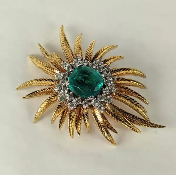 Elegant Faux Emerald and Diamond Plume Brooch.
