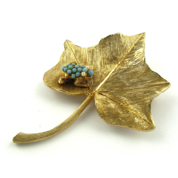 Gilded leaf brooch.