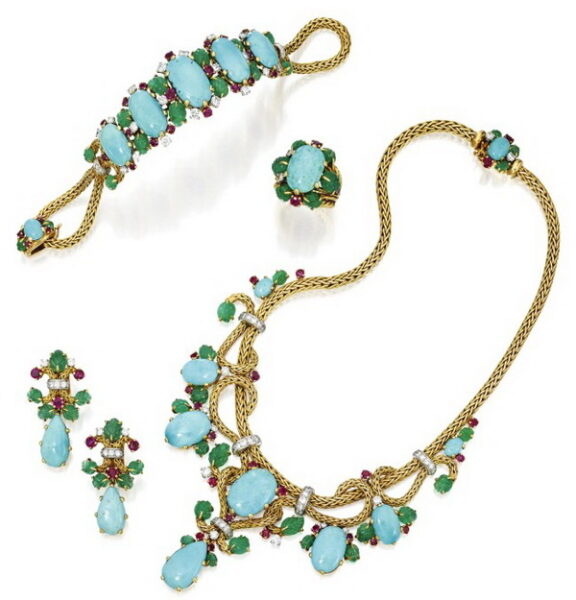 Jewelry set in gold and platinum with turquoise, emeralds, rubies and diamonds, Mauboussin, circa 1960.