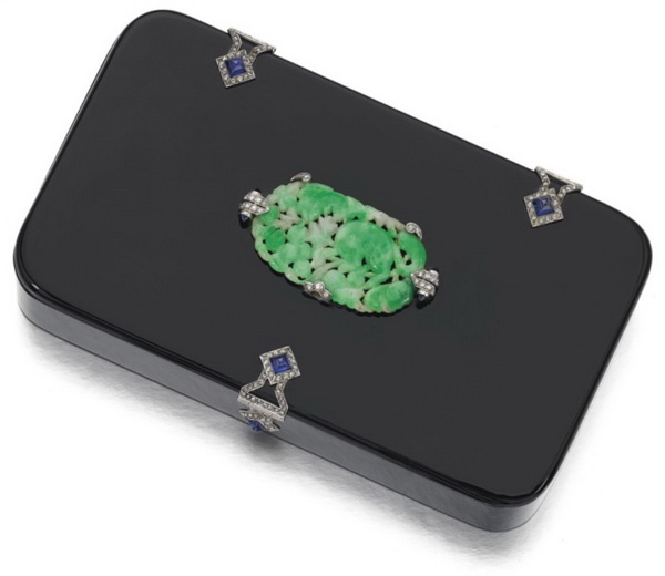 Onyx cosmetic bag with carved jadeite, sapphires and diamonds, Mauboussin, circa 1930.