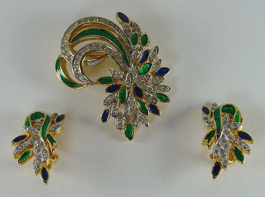 Pendant and earrings with enamel and rhinestones.