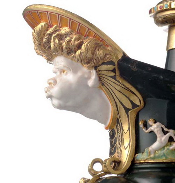 The spout of the jug is decorated with the image of Zephyr. The spout of the jug is decorated with the image of Zephyr.