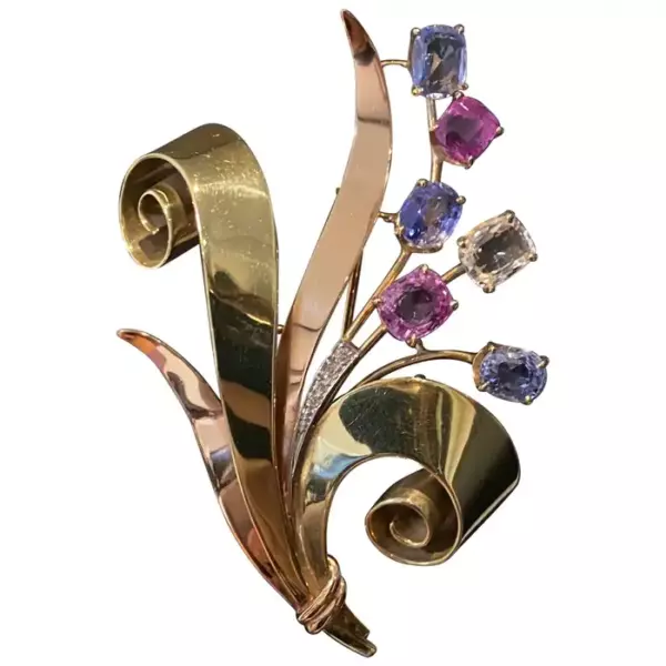 Trabert & Hoeffer Mauboussin Retro Reflection Sapphire Diamond Brooch Gold 1940s.