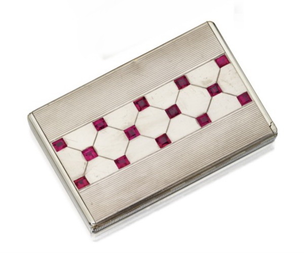 White gold cosmetic bag with rubies, Mauboussin, circa 1935.