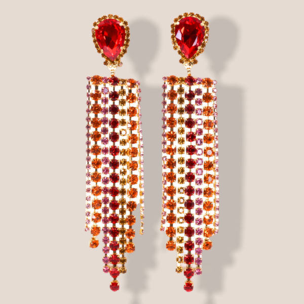 statement earrings feature a shoulder duster earring design on a three dimensional structure.