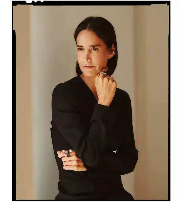 Ana Khouri wearing jewelry by Hugo Kreit.